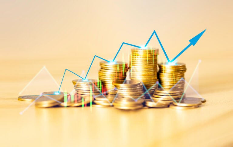 Coins are laid in graph.Business success concept wealth stock investment.Business in the digital age.Digital transformation for next generation technology.Technology is growing by leaps and bounds
